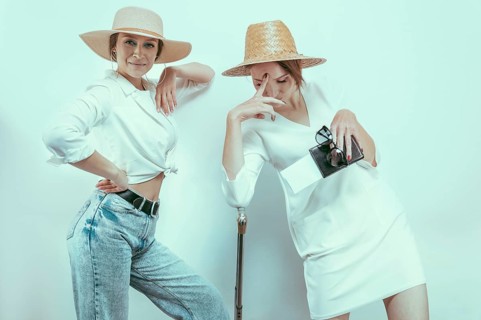 Portrait of two women with passports