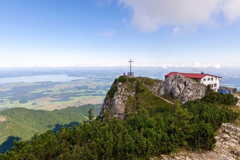 Summit cross on the Hochfelln with Hochfellnhaus
