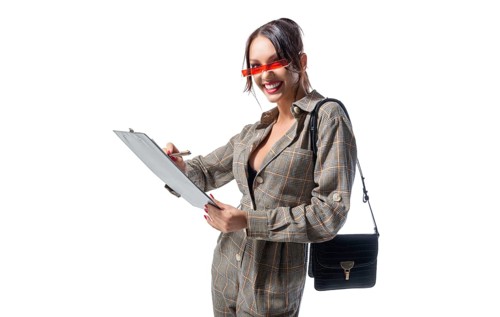 Beautiful brunette answers the test questions. She is pleased with herself. Business style. Interview concept.