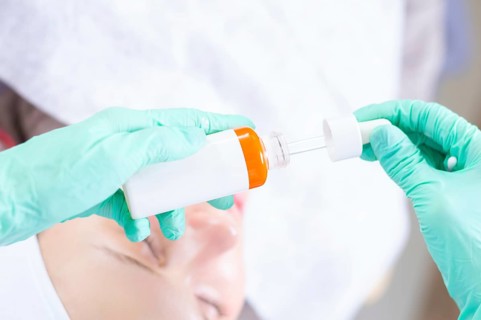 Image of bottles with medicines for facial skin care. Concept for beauty salons.