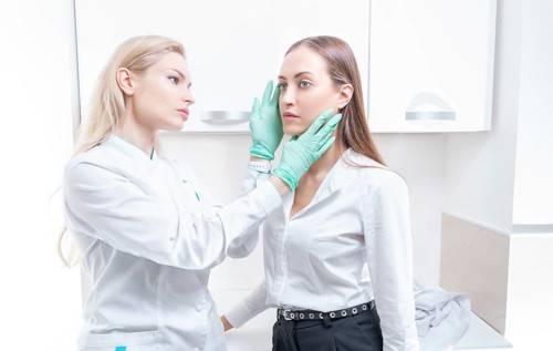 Two girls at the medical center. Consultation on rhinoplasty and blepharoplasty.