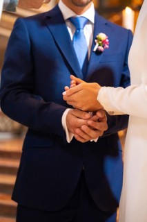 Bride and groom delivering earnest money at a church wedding