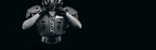 NO name portrait of a woman in shoulders pads. American football. Sports concept.