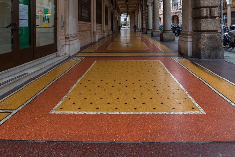 Floor mosaic in an arcade on Via XX Settembre