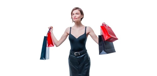 Business woman posing in studio with packages with gifts. International women's day concept. Valentine's Day