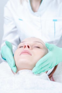 Portrait of a woman's face with problem skin. Peeling procedure. Natural beauty.