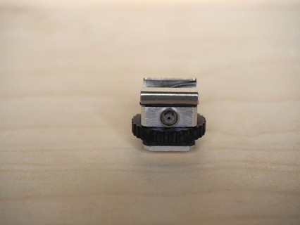 Camera hot shoe adapter