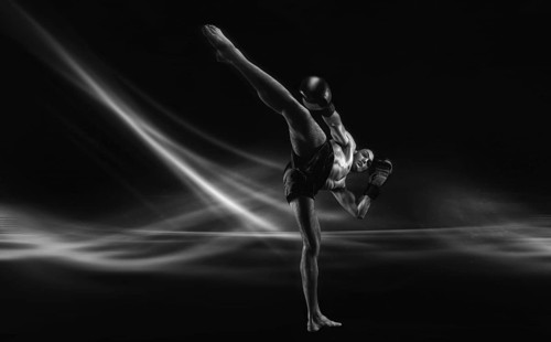 Black and white image of a mma fighter. Kickboxing concept. High quality