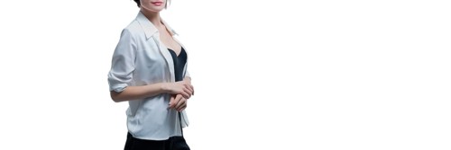 Portrait of stylish adult woman posing in studio over white background. Mentoring and coaching concept