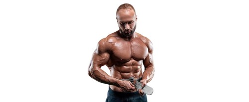 Athlete posing with an athletic belt on a white background. Fitness
