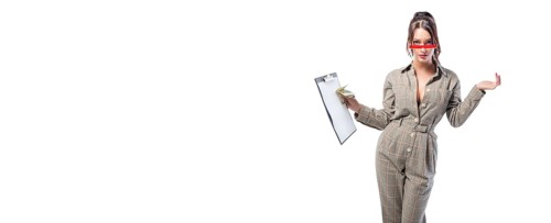 Woman interviewer stands in the studio on a white background with a tablet in her hand. Job interview concept. Recruiting and personnel selection.