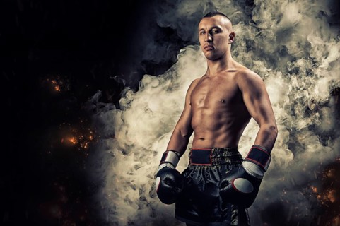 Portrait of a boxer of mixed martial arts. The concept of sports