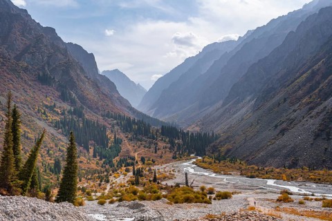 Mountain stream Ala Archa flows through the Ala Archa valley
