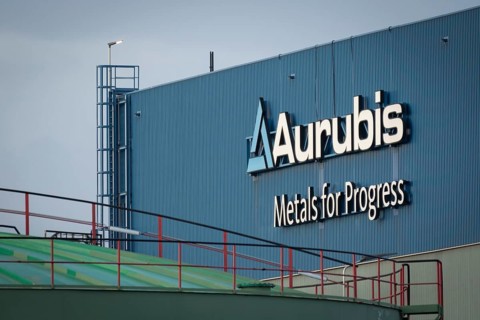 Logo and lettering Aurubis Metal for Progress on a factory building at the Aurubis AG plant