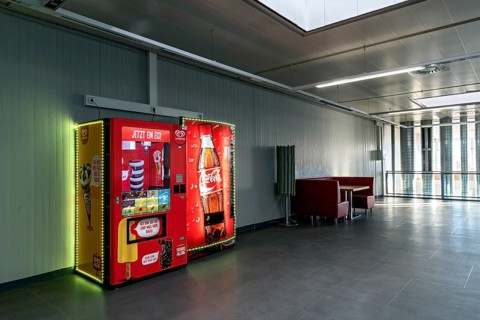 Vending machines for Langnese ice cream and Coca-Cola soft drinks in a waiting room