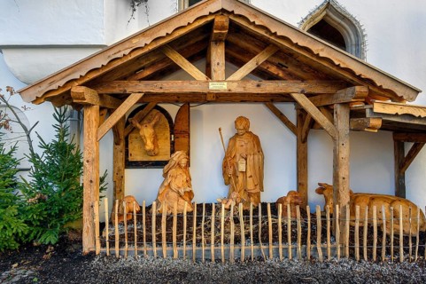 Grippe at the town hall with figures made of Swiss stone pine