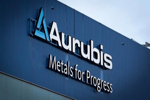 Logo and lettering Aurubis Metal for Progress on a factory building at the Aurubis AG plant
