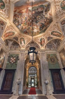 Room with ceiling frescoes in Palazzo Angelo Giovanni Spinola