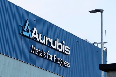 Logo and lettering Aurubis Metal for Progress on a factory building at the Aurubis AG plant