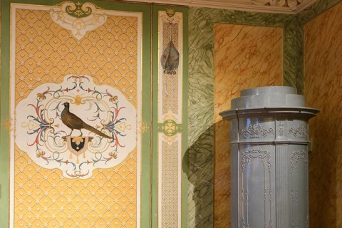 Painted wall panelling with pheasant