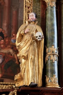 Baroque figure of a saint with skull