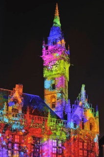 Monumental light projections on facade of Post Plaza by the French artist group Spectaculaires during the 2011 light festival of Ghent