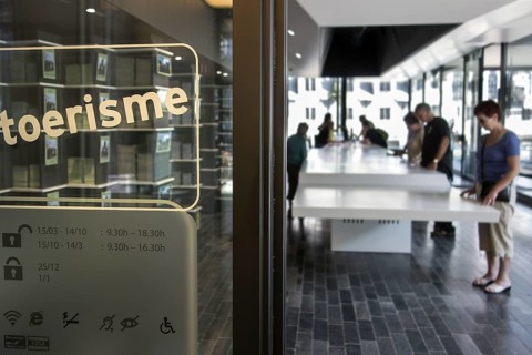 Tourists visiting the Ghent Tourist Information Centre