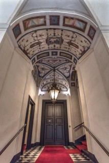 Staircase with ceiling frescoes in Palazzo Cattaneo Adorno