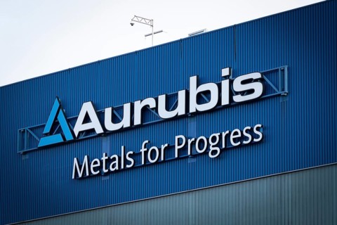Logo and lettering Aurubis Metal for Progress on a factory building at the Aurubis AG plant