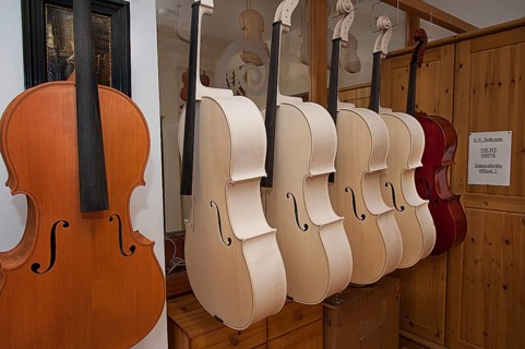 Cellos hanging in front of UV cabinet