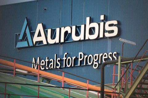 Logo and lettering Aurubis Metal for Progress on a factory building at the Aurubis AG plant