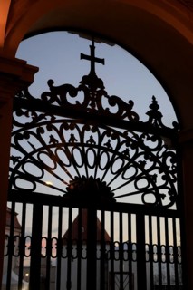 Wrought-iron grille in front of the imperial staircase