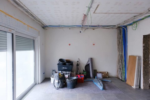 Room with newly laid electrical cables
