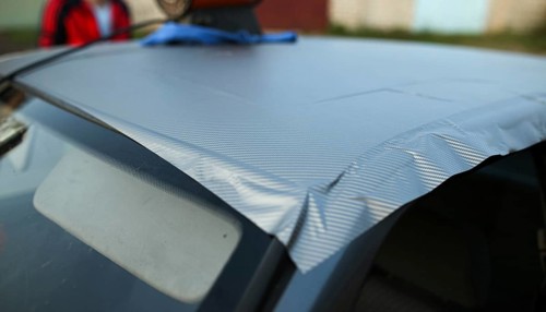 Covering the car body with carbon film