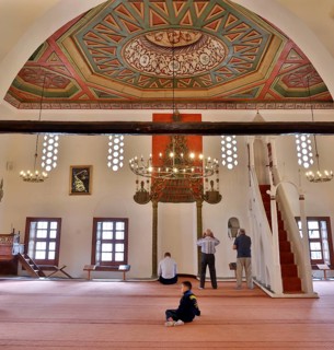 Worshippers pray in the royal mosque in Berat