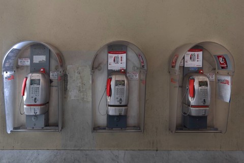 Public telephone booths under arcades