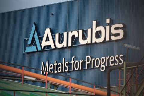 Logo and lettering Aurubis Metal for Progress on a factory building at the Aurubis AG plant
