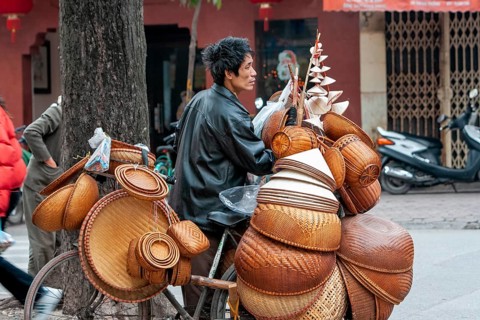 Basket seller in street of Hanoi