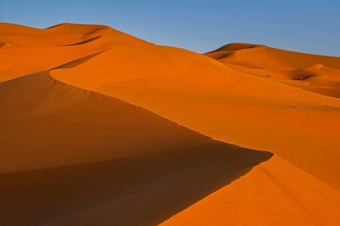Wind-swept sand dunes of Erg Chebbi in the Sahara Desert near Merzouga