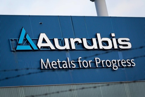 Logo and lettering Aurubis Metal for Progress on a factory building at the Aurubis AG plant