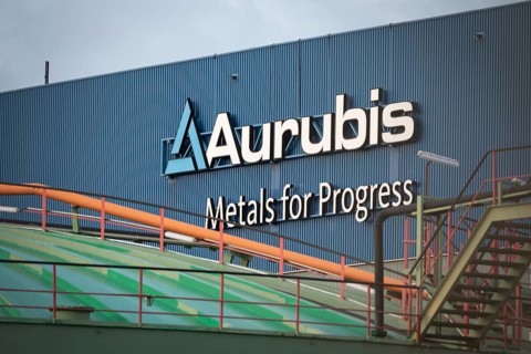 Logo and lettering Aurubis Metal for Progress on a factory building at the Aurubis AG plant