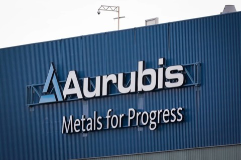 Logo and lettering Aurubis Metal for Progress on a factory building at the Aurubis AG plant
