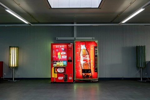 Vending machines for Langnese ice cream and Coca-Cola soft drinks in a waiting room