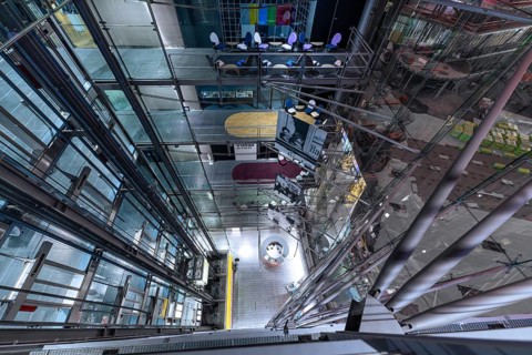 Interior of a modern building complex with escalators