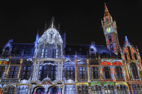 Monumental light projections on facade of Post Plaza by the French artist group Spectaculaires during the 2011 light festival of Ghent