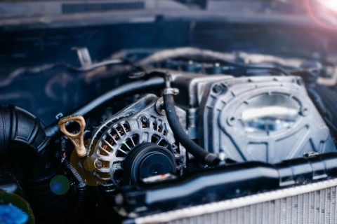 Generator in a car near an internal combustion engine