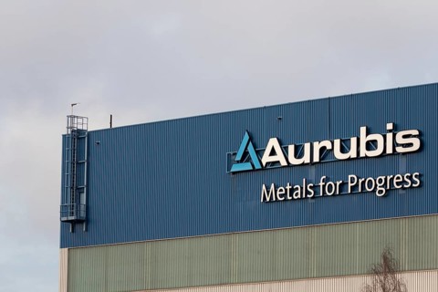 Logo and lettering Aurubis Metal for Progress on a factory building at the Aurubis AG plant