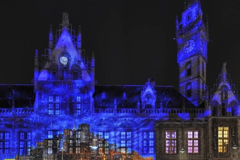 Monumental light projections on facade of Post Plaza by the French artist group Spectaculaires during the 2011 light festival of Ghent