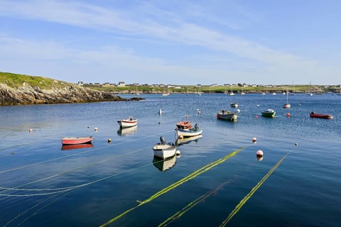 Boats on lines in the bay of Lampaul, Ouessant Island, Finistere, Brittany