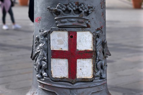 Coat of arms of Genoa on a lantern in Piazza de Ferrari, Genoa, Italy, Europe